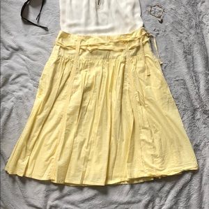 Pale yellow midi flare skirt with ribbon detailing